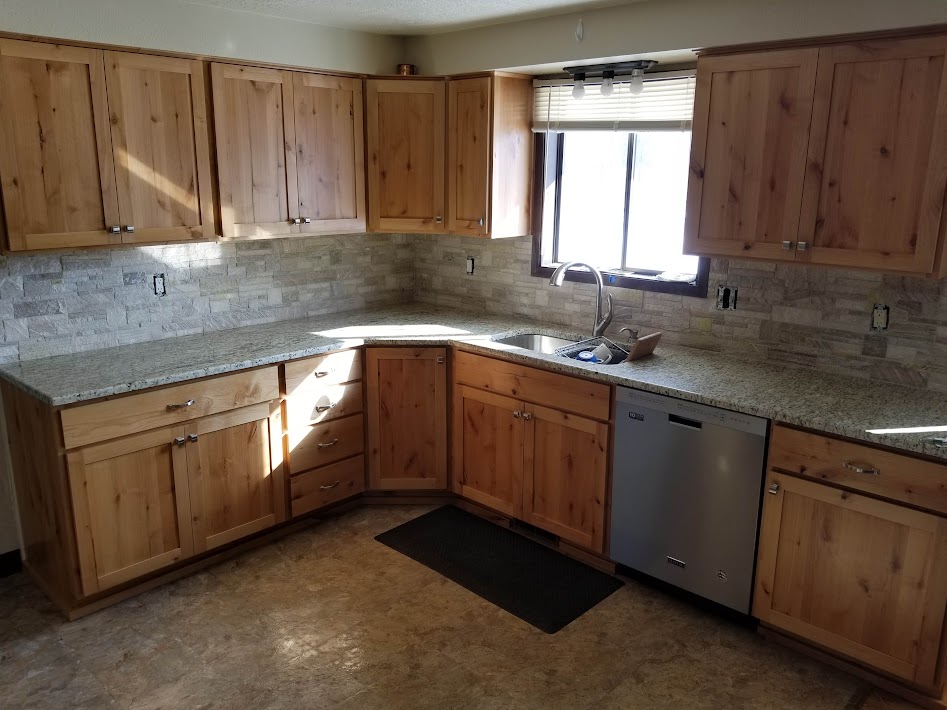 Stacked stone kitchen backsplash